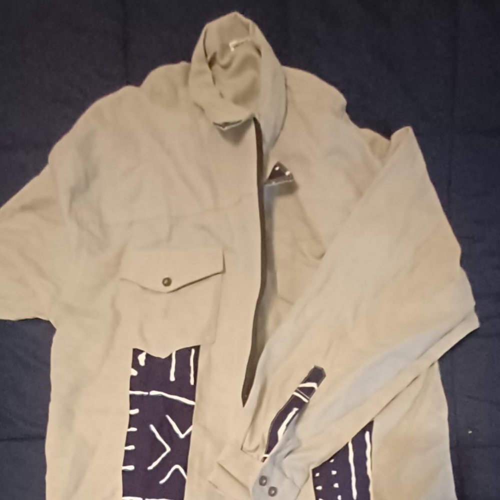 grey shirt/jacket with african inspired blue and white print patches